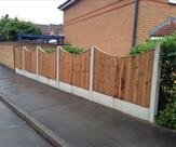 Concaved Panels Concrete Posts and Gravel Boards